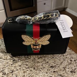 Black Vegan Leather with Gold Bee Accent. Wallet and Crossbody Strap NWT